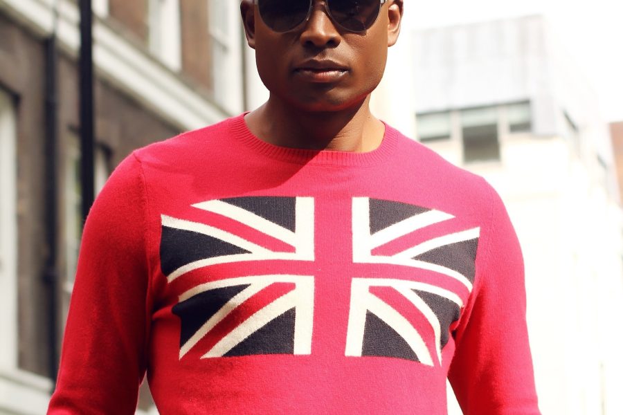 man wearing red top with union jack