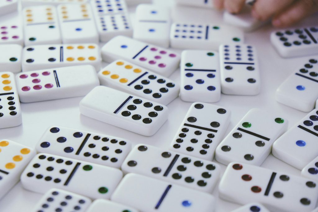 Different dominos, connected but different, with a selection of numbers shown