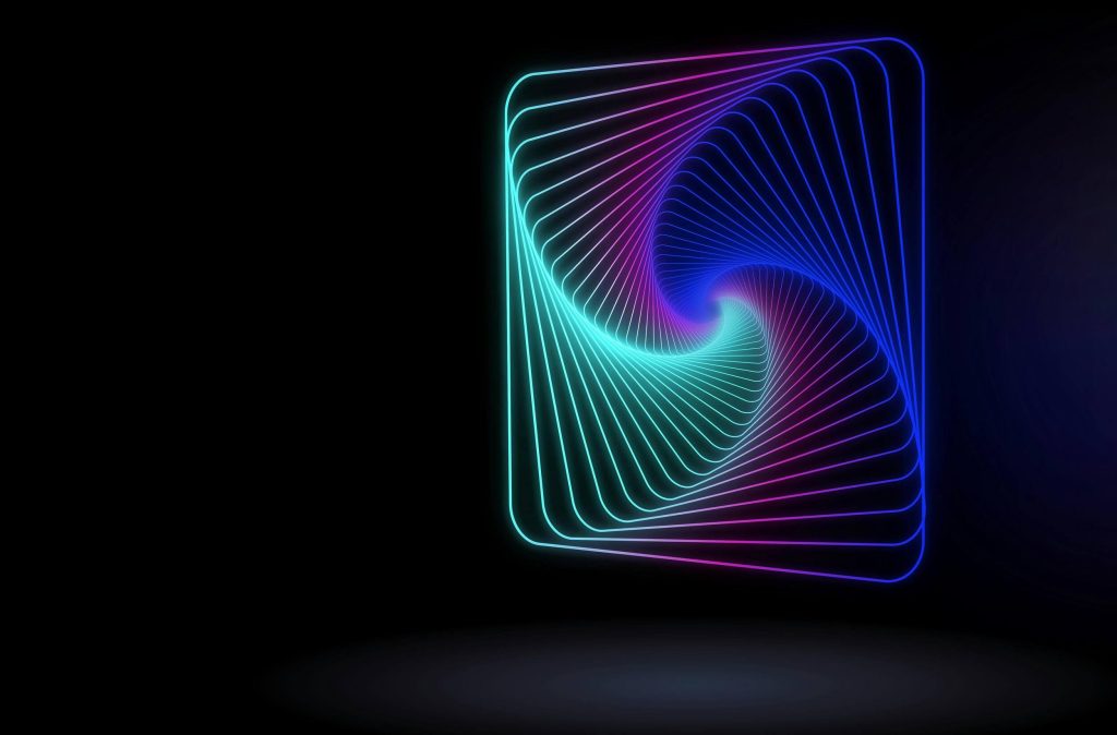 Square multicoloured light flare on a dark purple background featuring a spiral pattern