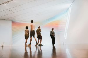 People standing in a museum space