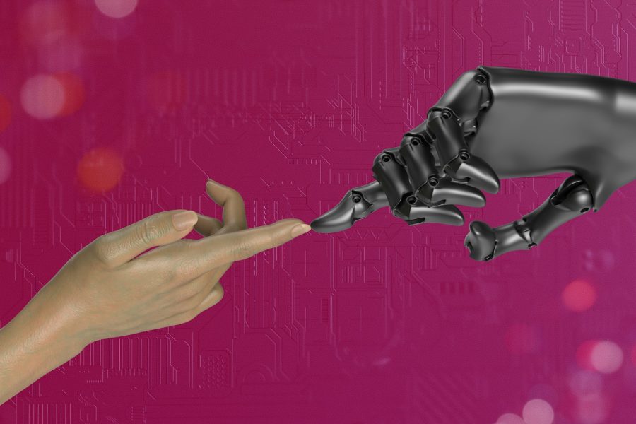 A robotic hand reaching out to a human hand