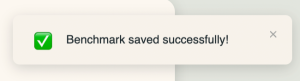 Screenshot showing notification confirming the selected benchmark has been saved successfully